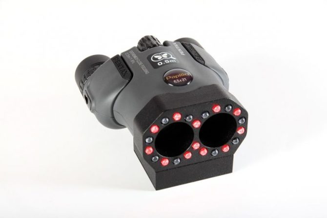 Close-up view of the Optic-2 detecting a hidden pinhole camera using red light mode