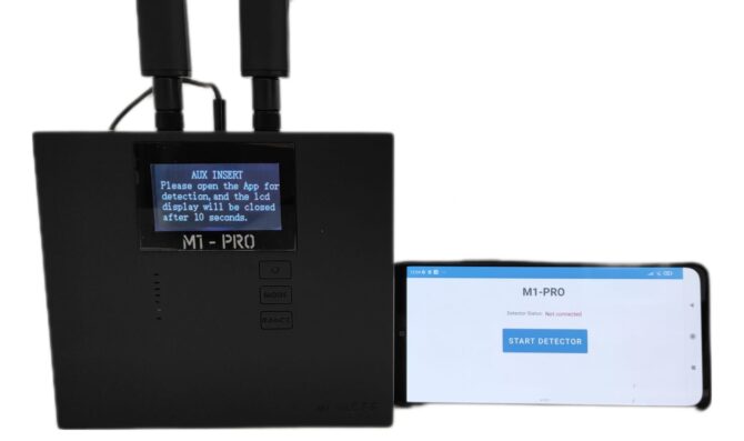 Operator using the MEFF M1-PRO to locate hidden surveillance devices with the signal strength track